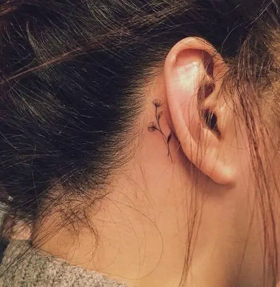 Tiny Flower Tattoo Behind Ear