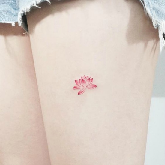 Tiny Lotus Flower Tattoo on Thigh