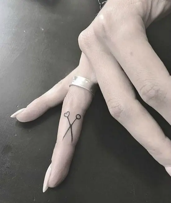 Tiny Scissor Finger Tattoo