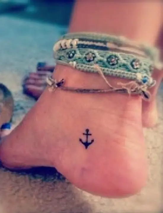 Tiny anchor tattoo on ankle