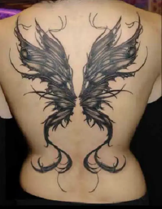 butterfly wings tattoo on back.