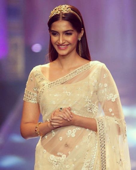 Charming Sonam Kapoor In Off White Transparent Saree