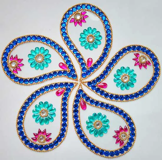 1 Mango shape kundan rangoli For wedding