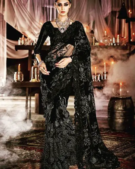 Black Designer With An Embellished Blouse