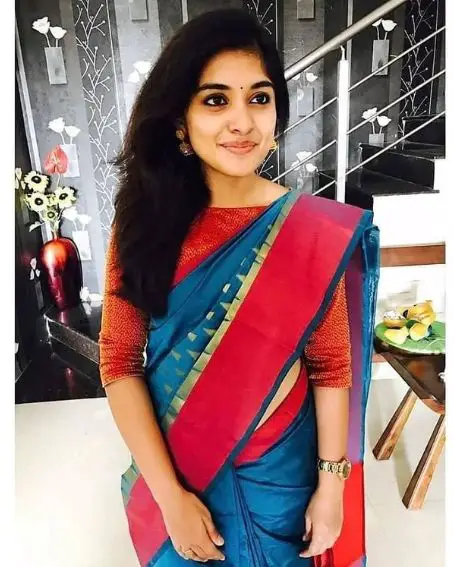 Nivetha Thomas in Blue Saree Paired with Boat Neck Blouse