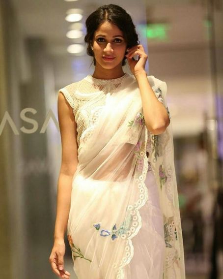 Lavanya Tripathi In White Floral Transparent Saree With Closed Neck Blouse