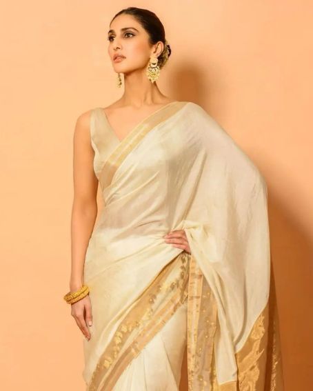 Vaani Kapoor In White And Skin Border Saree