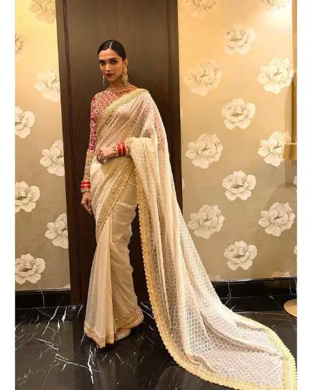 Deepika Padukone In Cream Saree With Red Embroidery Blouse