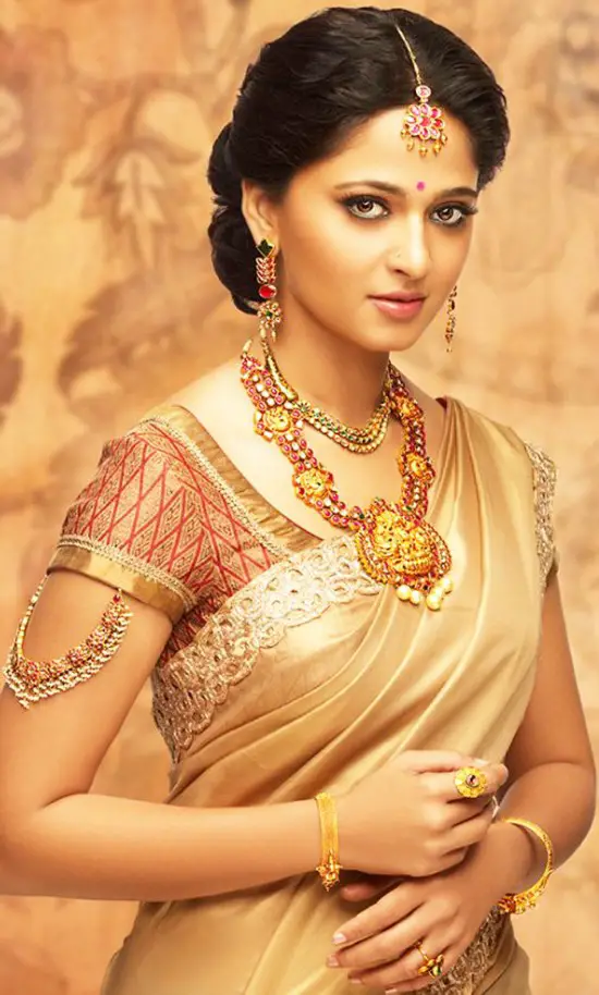 Plain Gold Saree And Matching Red And Gold Combination Blouse