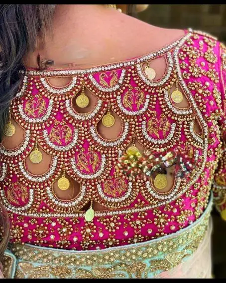 Kundan and stone embroidery work on pink blouse