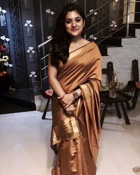 Nivetha Thomas in Copper Gold Saree