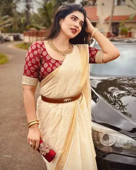 Splendid Kerala Kasavu Saree In Western Style Of Wearing