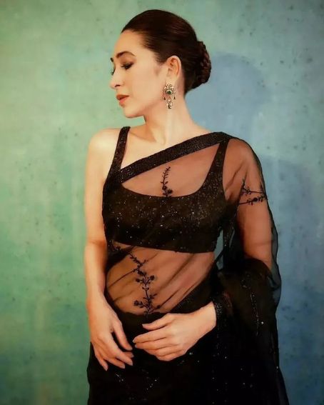 Superb Actress Karishma Kapoor In Black Transparent Saree