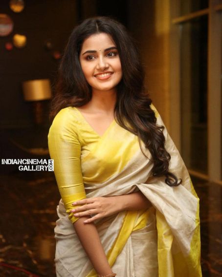 Anupama Parameswaran in Yellow Tissue Silk Saree