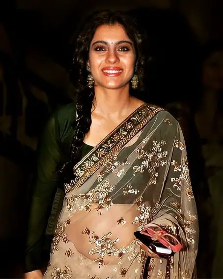 Elegant Look Of Kajol In A Cream Net Saree With Gold Embellished Work