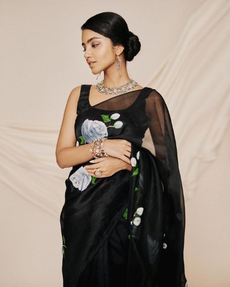 Anupama Parameswaran in Floral Black Organza Saree