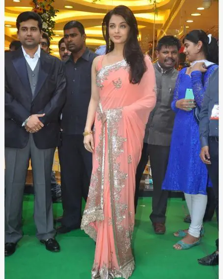 Glamorous Aishwarya Rai In Peach Color Saree Look