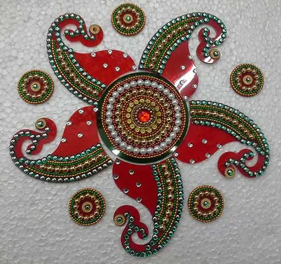 21 Modak In Red Colour With Green Stones