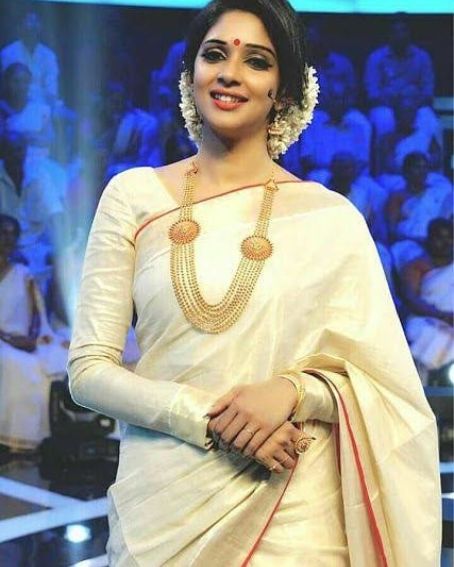 Cute Actress In Kerala Saree With Full Sleeve Blouse