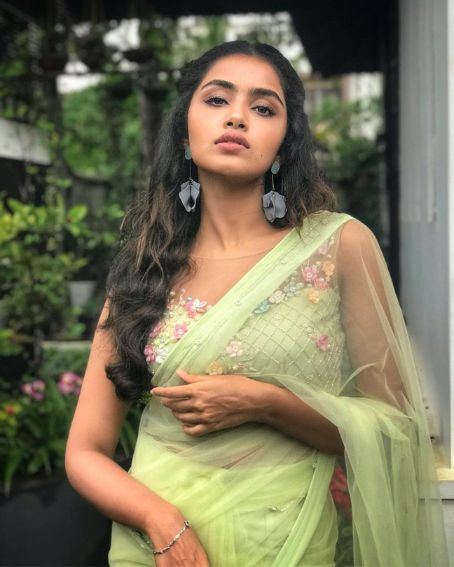 Anupama in Pastel Green Net Saree