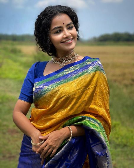 Anupama Parameswaran in Golden Yellow and Blue Combination Saree