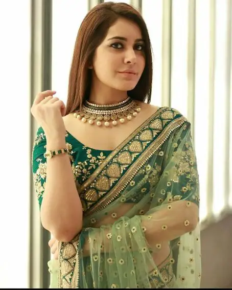 Rashi Khanna In Green And Gold Net Saree With Heavy Embroidery Work