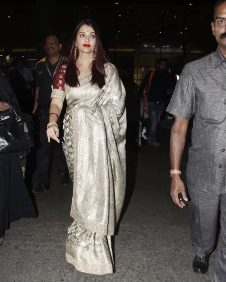 Stunning Aishwarya Rai In Silver And Maroon Saree