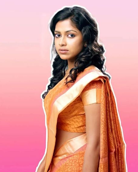 Orange With Border Colored Saree In Calm Looking