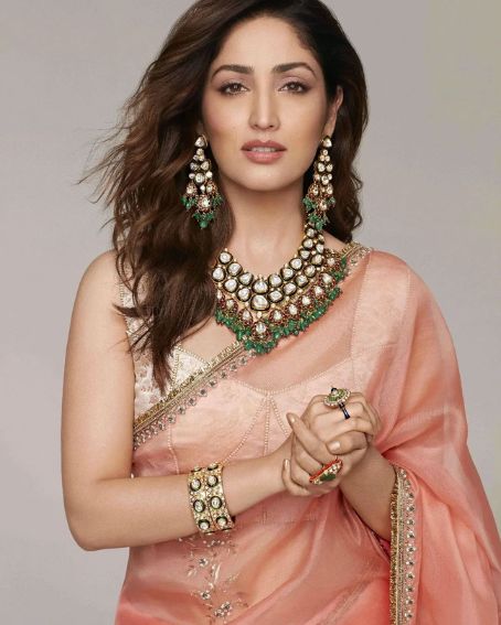 Yami Gautam In Peach Chiffon Saree