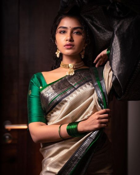 Anupama Parameswaran in Mini Checked Cream and Black Combo Saree