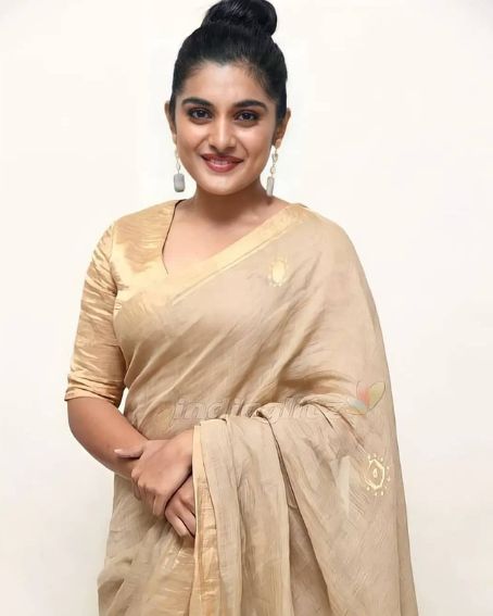 Nivetha Thomas in Gold Saree