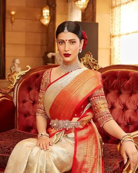Shruti Hassan In White Silk Saree With Red Golden Border