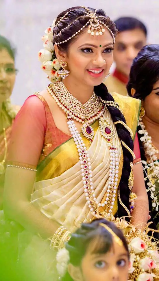 15 Kerala Wedding Sarees & Blouse Designs