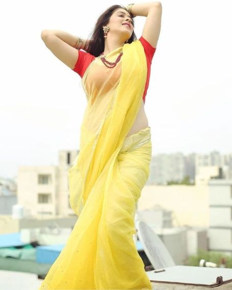 Excellent Yellow Saree With Contrast Blouse
