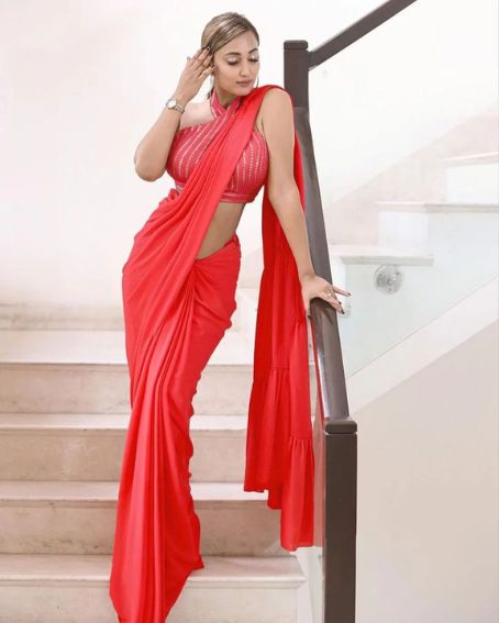 Glamorous Satin Red Saree With Sleeveless Blouse