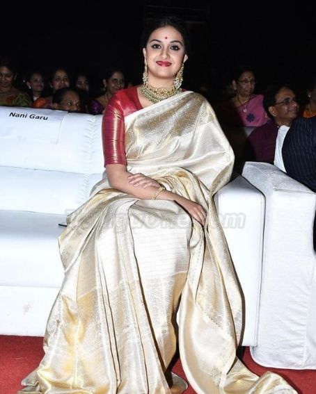 Keerthi In Malai Silk Saree With Contrast Red Blouse