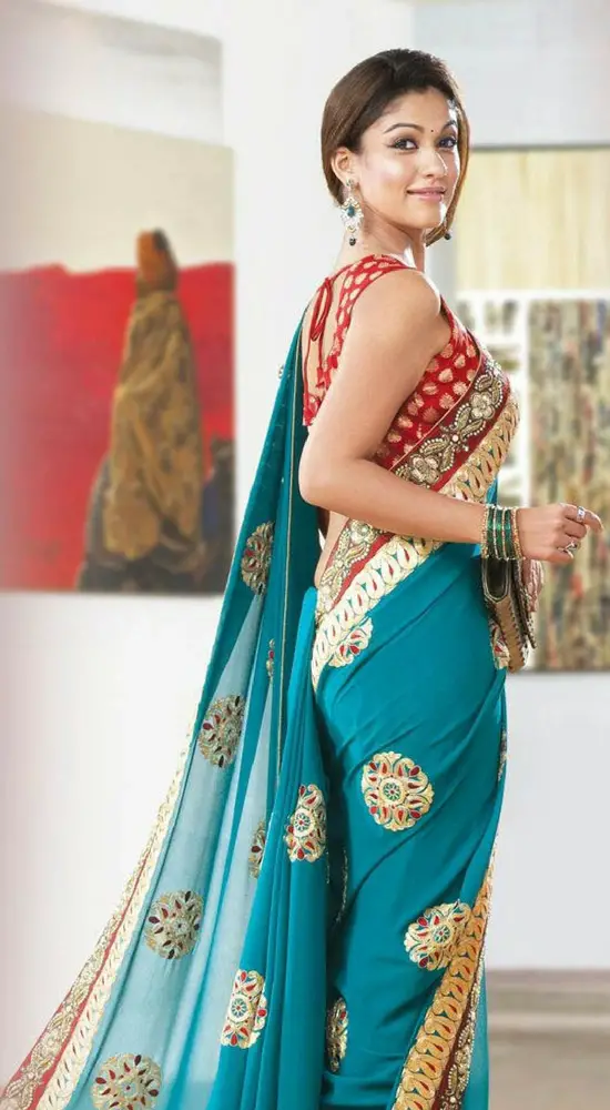 Nayantara In Ice Blue Embroidery Saree With Red Blouse
