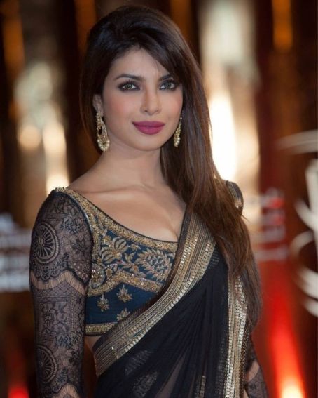 Priyanka Chopra In Black Transparent Saree With Full Sleeve Blouse