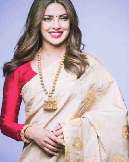 Priyanka Chopra In White Banarasi Saree With The Red Blouse