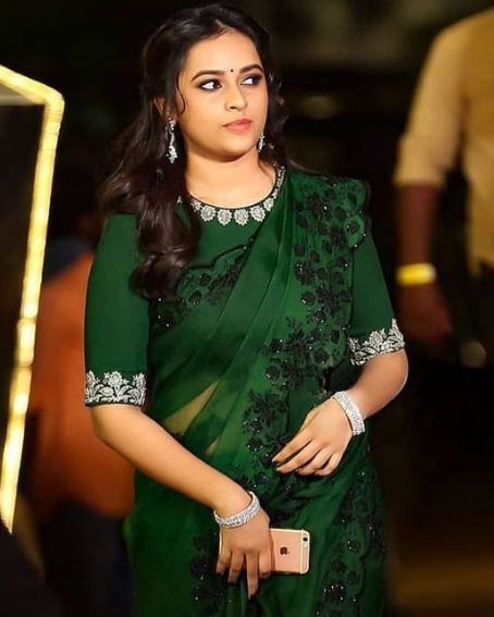 Sri Divya In Green Transparent Saree With Black Embroidery