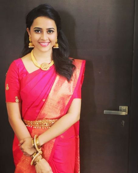 Sri Divya In Pink Saree With One Side Border