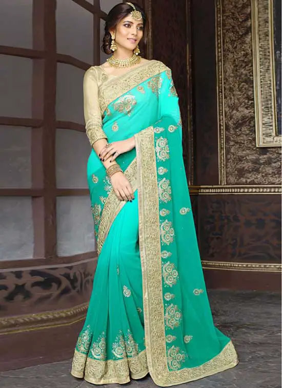 Turquoise and Sea Green embroidered Georgette Saree 