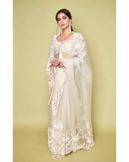 Vibrant Sonam Kapoor In White Transparent Net Saree