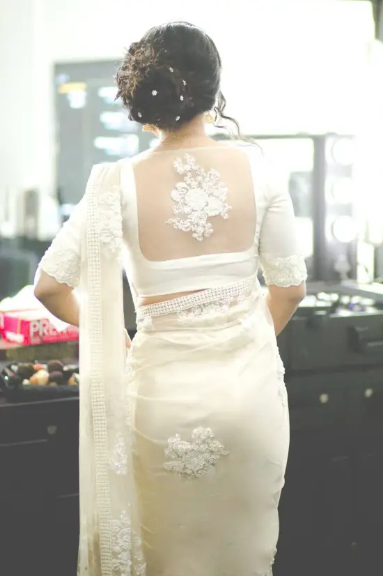 White Embroidery Flower On Back Center Of The Net Blouse