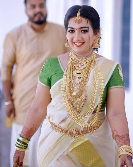  White Saree With Green Blouse Kerala Wedding Saree