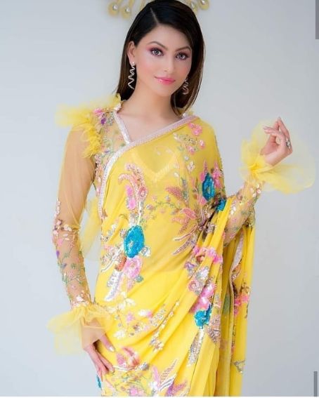 Urvashi Rautela In Stunning Yellow Designer Saree With Net Sleeve Blouse