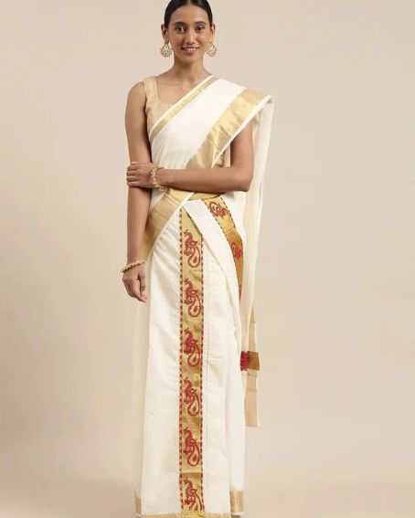 Mesmerizing Off White And Gold Tussar Silk Saree With Different Draping