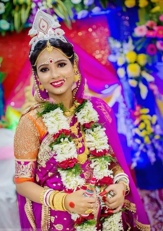Bengali Bridal Wearing Purple Saree Paired With Embllished Blouse
