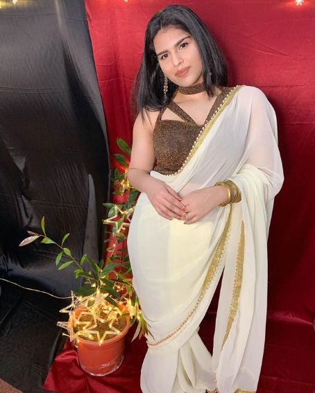 Fascinating Off White And Gold Designer Saree