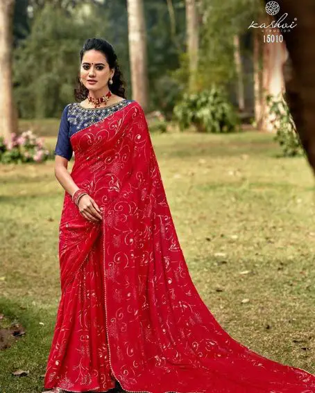 Red Printed Saree With Royal Blue Boat Neck Mirror Work Blouse